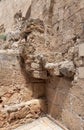 Remains  of the fortress walls in the courtyard of the Crusader fortress of the old city of Acre in northern Israel Royalty Free Stock Photo