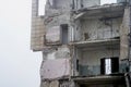 The remains of the frame of a large concrete building close-up. Background