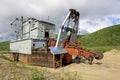 The remains of a historical delelict gold dredge on Bonanza creek near Dawson City, Canada