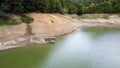 remains of a house that was submerged under water