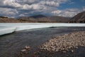 Remains of ice in the valley of a mountain river.