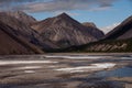 Remains of ice in the valley of a mountain river.