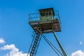 Remains of iron curtain with watchtower