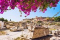 Remains of the Library of Hadrian, Plaka district and Acropolis in Athens old town, Greece. Famous landmark and popular travel des