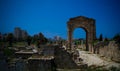 Remains of necropolis and Arch in ancient columns excavation site in Tyre, Lebanon Royalty Free Stock Photo