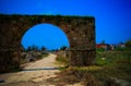 Remains of necropolis and Arch in ancient columns excavation site in Tyre, Lebanon Royalty Free Stock Photo