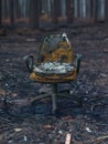 Remains Of An Office Chair After A Forest Fire Royalty Free Stock Photo