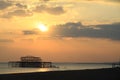 Remains of old Brighton Pier left standing in sea at sunset,, England, UK Royalty Free Stock Photo