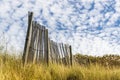 Remains of old fence in the meadow Royalty Free Stock Photo