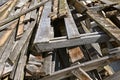 Pile of old lumber from a deck which has been torn apart. Royalty Free Stock Photo