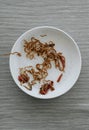 The remains of a plate of chicken yakisoba noodles