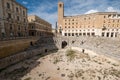 Remains of Roman amphitheatre in Piazza Sant`Oronzo, in the centre of the historic city of Lecce, Puglia, Southern Italy. Royalty Free Stock Photo