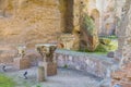 Remains of Roman column ( capitals ) in the ruins of ancient Roman Baths of Caracalla (Thermae Antoninianae)