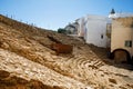 Remains of the Roman Theatre of the ancient Gades in Hispania, with the belfry of the Santa Cruz Cathedral in the