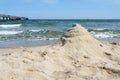 Remains of a sand castle on the beach of KÃ¼hlungsborn in Germany Royalty Free Stock Photo