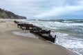 The remains of a seagoing vessel on the shore. Old Rusty Ship. The rusted wreckage of an old ship Royalty Free Stock Photo