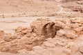 Remains of a side street with an arched ceiling in a Roman city in the Nabataean Kingdom of Petra in the Wadi Musa city in Jordan Royalty Free Stock Photo