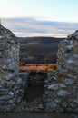 Remains of small square room in castellated wall of medieval castle Hrusov, possibly embrasure. Royalty Free Stock Photo