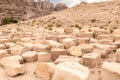 Remains of stone columns in Nabatean Kingdom of Petra in Wadi Musa city in Jordan