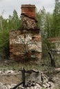 The remains of the stove in an old burned house in an abandoned village evicted during the Chernobyl accident Royalty Free Stock Photo