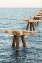 Remains of the structure of an old dock in the Port of Sagunto Royalty Free Stock Photo