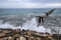 Remains of the structure of an old dock in the Port of Sagunto Royalty Free Stock Photo
