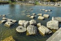 Remains of temple pillars in a pond Royalty Free Stock Photo