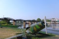 Remains of a Thai aircraft destroyed during World War II and the Burma Railway Bridge on the River Kwai