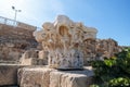 Remains of the upper part of the Roman column of white marble in the ruined city of Caesarea in Israel.