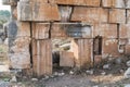 The remains of the wall on the ruins of the destroyed Roman temple, located in the fortified city on the territory of the Naftali Royalty Free Stock Photo