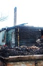 The remains of the wooden house after the fire Royalty Free Stock Photo