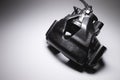 Remanufactured disc brake caliper painted dark gray. Brake system restoration Royalty Free Stock Photo