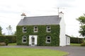 Ireland, Donegal, near Bundoran: Irish House with Ivy-covered Front Wall Royalty Free Stock Photo