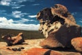 Remarkable rocks with blue and white sky, impressive landmark on