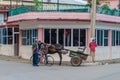 REMEDIOS, CUBA - FEB 12, 2016: Local people and horse carriage in Remedios town, Cu