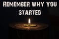 Remember why you started - white candle with dark background - i