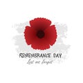 Remembrance Day November 11 typography with red poppy flower - international symbol of peace, text is Lest we forget for Memorial