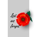 Remembrance Day November 11 typography with red poppy flower - international symbol of peace, text is Lest we forget for Memorial Royalty Free Stock Photo