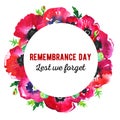 Remembrance day poppy round composition. Red flowers and title Lest we forget. Hand drawn watercolor sketch illustration Royalty Free Stock Photo