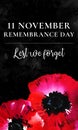 Remembrance day vertical banner design. Poppy flower on the bottom of the page with title on black textured background Royalty Free Stock Photo