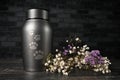 In remembrance of a pet. Pet urn beside a flower bouchet. Royalty Free Stock Photo