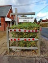 Remembrance poppies outside of a village hall in the UK