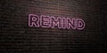 REMIND -Realistic Neon Sign on Brick Wall background - 3D rendered royalty free stock image