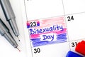 Reminder Bisexuality Day in calendar with red and blue pens