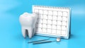 Reminder calendar for visiting the dentist. Dental appointment, check. Calendar with a tooth and a dental mirror on a Royalty Free Stock Photo