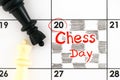 Reminder Chess Day in the calendar with black and white chess pieces on it. July 20 Royalty Free Stock Photo