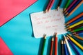 ÃÂ«You mustn`t be late for schoolÃÂ», - note for a schoolboy from a loving mother lies next to the colored pencils