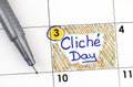 Reminder Cliche Day in calendar with pen