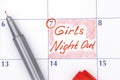 Reminder Girls Night Out in calendar with pen