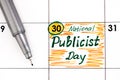 Reminder National Publicist Day in calendar with pen